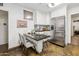 Bright eat-in kitchen featuring stainless steel appliances, granite countertops, and white cabinetry at 2731 N 23Rd Ave, Phoenix, AZ 85009