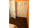 Bedroom closet featuring folding doors for organized storage and convenience in the living space at 2840 W Marlette Ave, Phoenix, AZ 85017