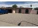 Charming single-story home with a low-maintenance rock yard and arched windows at 2840 W Marlette Ave, Phoenix, AZ 85017