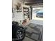 Garage interior with organized tools, tires, and blue pickup truck partially visible at 2840 W Marlette Ave, Phoenix, AZ 85017