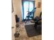 Home gym featuring workout equipment and natural light, providing a dedicated fitness space at 2840 W Marlette Ave, Phoenix, AZ 85017