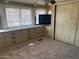 Bedroom featuring built-in cabinets and carpet at 3104 E Broadway Rd # 295, Mesa, AZ 85204
