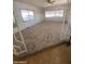 Bright living room featuring carpet and windows at 3104 E Broadway Rd # 295, Mesa, AZ 85204