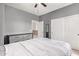 Bedroom featuring a spacious layout, large windows, closet, and a grey color scheme at 3190 S Holguin Way, Chandler, AZ 85248