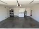 This garage features a washer, dryer, storage shelving, and water heater at 327 E La Jolla Dr, Tempe, AZ 85282