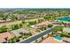 Extensive aerial view showcasing the community with its homes, green spaces, and convenient street layout at 3400 S Whetstone Pl, Chandler, AZ 85286