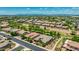 Beautiful aerial view of a neighborhood featuring mature trees, single-Gathering homes and desert landscaping at 3400 S Whetstone Pl, Chandler, AZ 85286