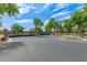 Gated community entrance with stone pillars and wrought iron gates, providing security and curb appeal at 3400 S Whetstone Pl, Chandler, AZ 85286