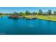 Scenic Layton Lakes with a waterfront gazebo and picturesque views, perfect for relaxation and community gatherings at 3400 S Whetstone Pl, Chandler, AZ 85286