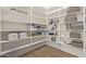 Organized walk-in pantry with ample shelving, providing plenty of storage for food and kitchen essentials at 3400 S Whetstone Pl, Chandler, AZ 85286