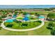 Aerial view of community playground, showcasing colorful sunshades and various play structures at 3400 S Whetstone Pl, Chandler, AZ 85286