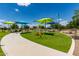 Community playground with modern equipment and colorful sunshades offers a fun recreational space at 3400 S Whetstone Pl, Chandler, AZ 85286