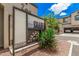 Community signage at The Shades with desert landscaping and a view of the modern townhomes at 3900 E Baseline Rd # 137, Phoenix, AZ 85042
