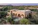 Aerial view of luxurious home, showcasing its elegant design and pool at 40039 N 107Th Pl, Scottsdale, AZ 85262