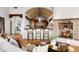 Open-concept living space with a fireplace, breakfast bar and cozy seating at 40039 N 107Th Pl, Scottsdale, AZ 85262