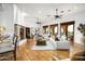 Spacious living room boasts a fireplace, high ceilings and natural light at 40039 N 107Th Pl, Scottsdale, AZ 85262