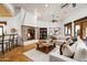 Inviting living room featuring a cozy fireplace and stylish furnishings at 40039 N 107Th Pl, Scottsdale, AZ 85262