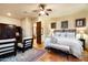 Inviting bedroom with tiled floors, a comfortable seating area, and beautiful doorway at 40039 N 107Th Pl, Scottsdale, AZ 85262