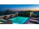 Relax in this backyard oasis with a stunning pool, tiled deck, wrought iron fencing, and mountain views at 40039 N 107Th Pl, Scottsdale, AZ 85262