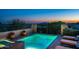 Stunning pool and spa area with lounge seating, lush plants, and panoramic vista at 40039 N 107Th Pl, Scottsdale, AZ 85262
