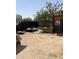 Backyard featuring an outbuilding or storage shed and secure fencing at 4233 E Minton St, Phoenix, AZ 85042
