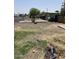 A partially landscaped yard that offers space for customization and improvement at 4233 E Minton St, Phoenix, AZ 85042