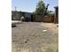 Spacious, partially landscaped backyard providing room for outdoor activities at 4233 E Minton St, Phoenix, AZ 85042