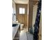 Bathroom showcasing a toilet, vanity, and a shower with a patterned curtain at 4233 E Minton St, Phoenix, AZ 85042