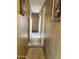Hallway with paneled walls, connecting different areas of the home at 4233 E Minton St, Phoenix, AZ 85042