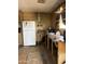 Kitchen features a refrigerator, sink, and ample counter space at 4233 E Minton St, Phoenix, AZ 85042