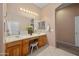 Bright bathroom featuring double sinks, vanity area, and decorative accents at 4281 S Tecoma Trl, Gold Canyon, AZ 85118