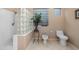 Bathroom with walk-in shower, glass block window and bidet at 4281 S Tecoma Trl, Gold Canyon, AZ 85118