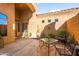 Private courtyard with seating area and desert plants at 4281 S Tecoma Trl, Gold Canyon, AZ 85118