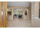 Elegant foyer leading into the living room with fireplace at 4281 S Tecoma Trl, Gold Canyon, AZ 85118