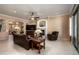 Inviting living room with a fireplace and comfortable leather seating at 4281 S Tecoma Trl, Gold Canyon, AZ 85118