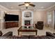 Bright living room with fireplace and media center at 4281 S Tecoma Trl, Gold Canyon, AZ 85118