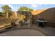 Outdoor living space features a charming gazebo and built in grill at 4281 S Tecoma Trl, Gold Canyon, AZ 85118