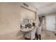 Breakfast nook pass-through with bar-height counter and cushioned stools at 4434 E Wood St, Phoenix, AZ 85040