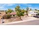 An aerial view showcases the home's landscaping, driveway, and surrounding neighborhood at 4510 W North Ln, Glendale, AZ 85302