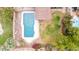 Backyard aerial view highlighting a private pool with a covered patio and manicured landscaping at 4510 W North Ln, Glendale, AZ 85302