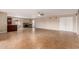 Spacious living room with tile flooring, fireplace, and neutral paint at 4510 W North Ln, Glendale, AZ 85302