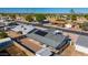 Gathering home has solar panels on the roof, with a private yard in a community setting at 4645 E Covina St, Mesa, AZ 85205