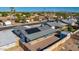 Aerial view of a Gathering-friendly neighborhood home with a spacious backyard and solar panels at 4645 E Covina St, Mesa, AZ 85205