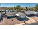 Stunning aerial view of a well-maintained single-Gathering home with a spacious backyard and desert landscaping at 4645 E Covina St, Mesa, AZ 85205