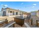 Inviting backyard with a fire pit, seating area, covered patio, and low-maintenance gravel landscaping at 4645 E Covina St, Mesa, AZ 85205