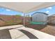 Outdoor space with a colorful hammock stretched between posts, and a shed at 4645 E Covina St, Mesa, AZ 85205