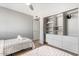 Cozy bedroom with custom closet with drawers and shelves, suitable for organization and storage at 4645 E Covina St, Mesa, AZ 85205