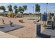 A well-equipped playground with slides, swings, and climbing frames for children to play and explore at 4645 E Covina St, Mesa, AZ 85205