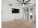 This cozy bedroom features a ceiling fan, carpet flooring, and plenty of natural light at 5200 S Lakeshore Dr # 120, Tempe, AZ 85283