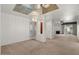 Large living area with neutral carpet and ample natural light, perfect for relaxing and entertaining at 5200 S Lakeshore Dr # 120, Tempe, AZ 85283